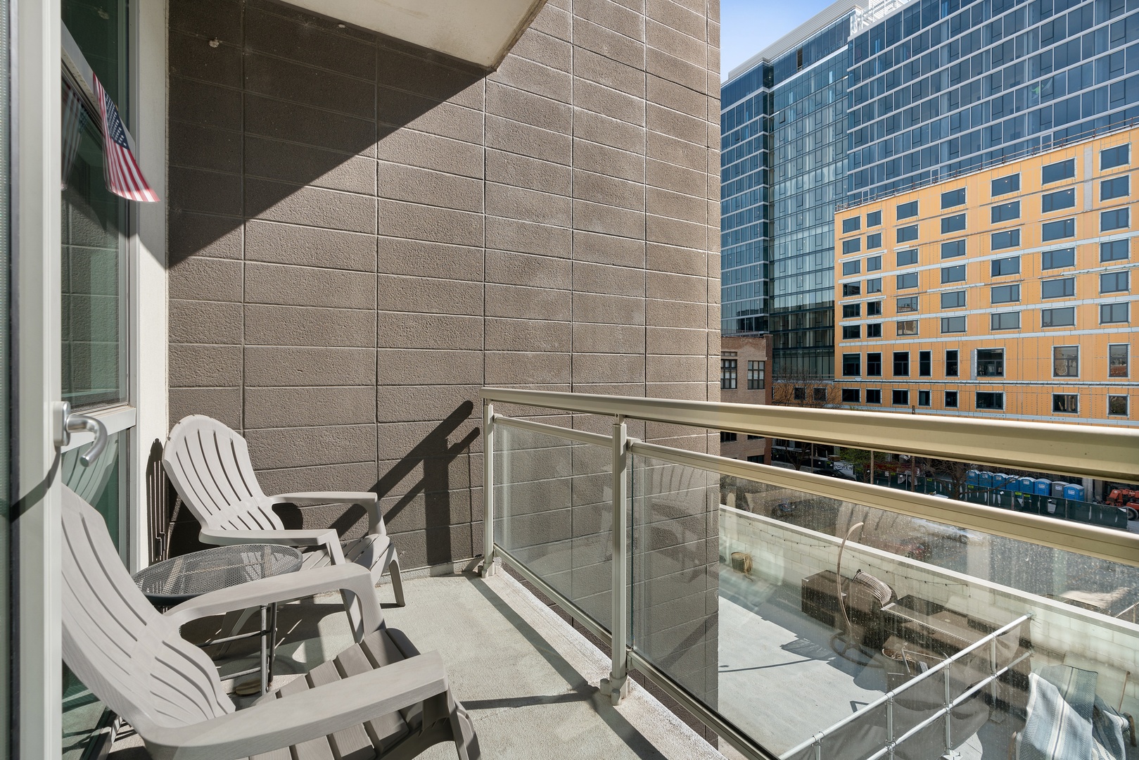225 South Sangamon Street, Unit 402 Chicago, IL 60607 - Photo 11 of 12 a view of a balcony with chairs