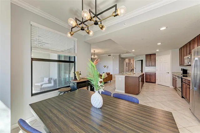 an aerial view of a building with a swimming pool