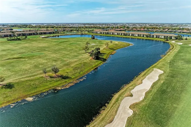 a view of a dining area with furniture window and wooden floor