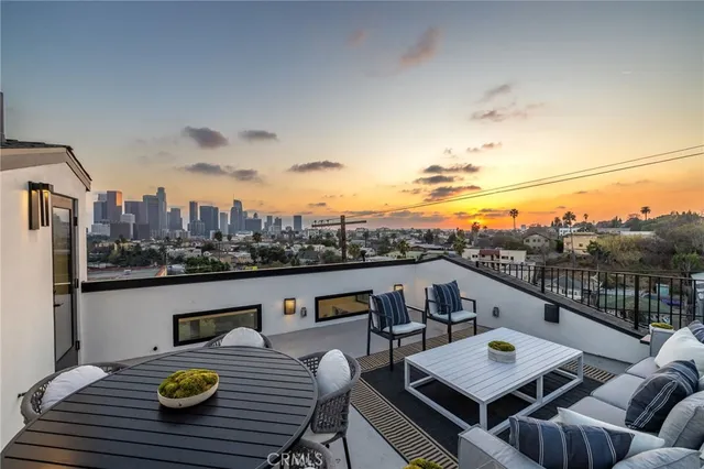 a view of a terrace with sitting area
