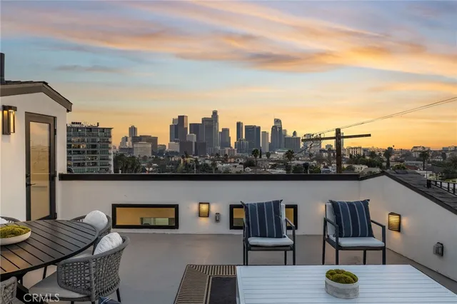 a view of a terrace with chairs
