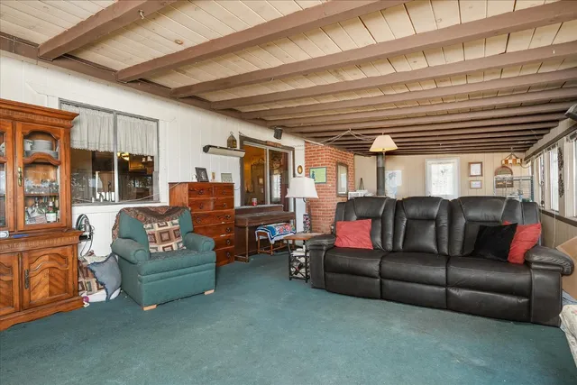 a media room with lots of chairs and a projector