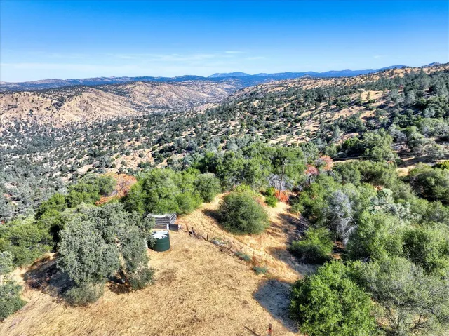 a view of a city with mountains in the background
