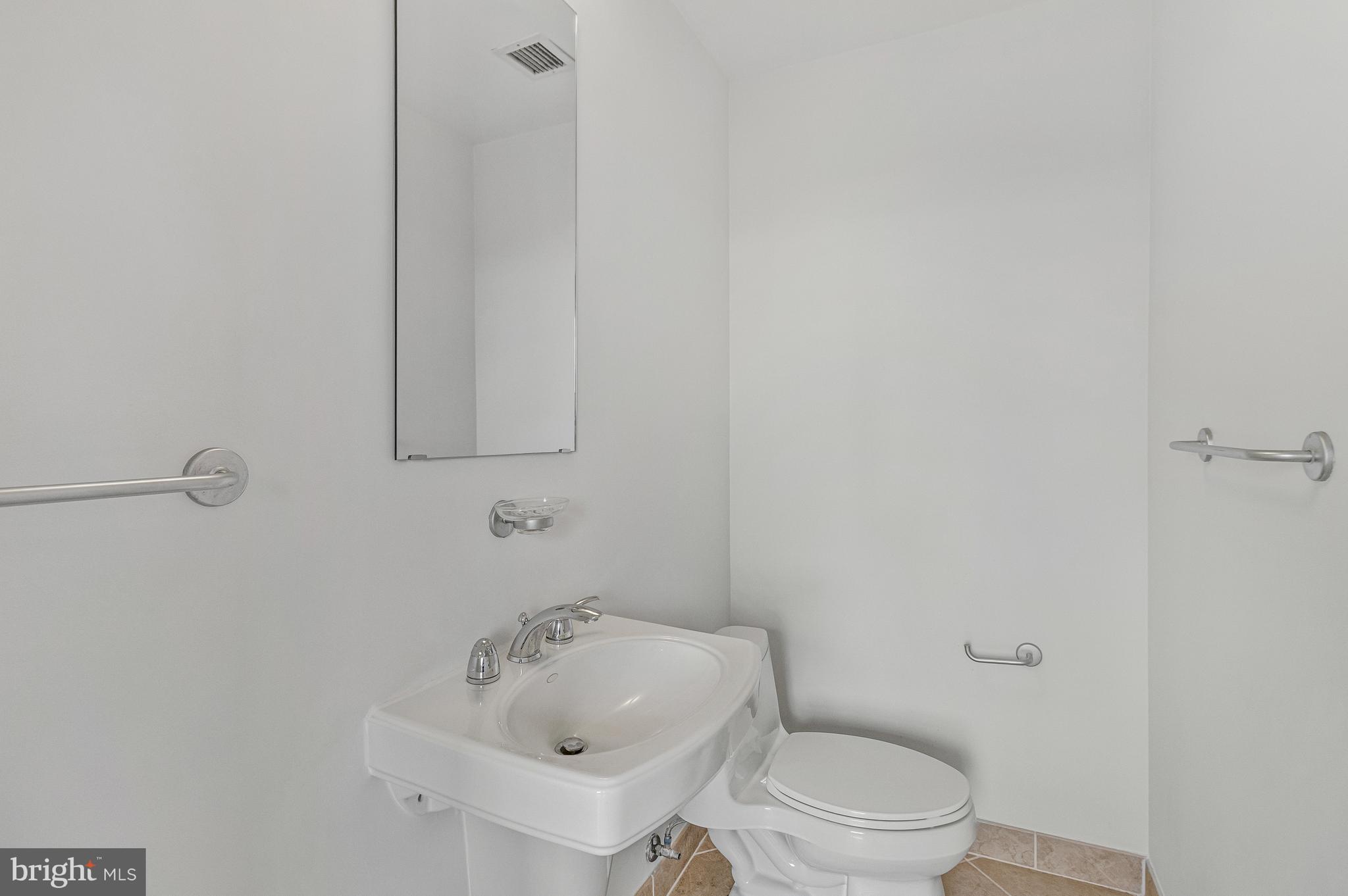 675 E Street Northwest, Unit 900 Washington, DC 20004 - Photo 37 of 41 Powder Room in Den/Office
