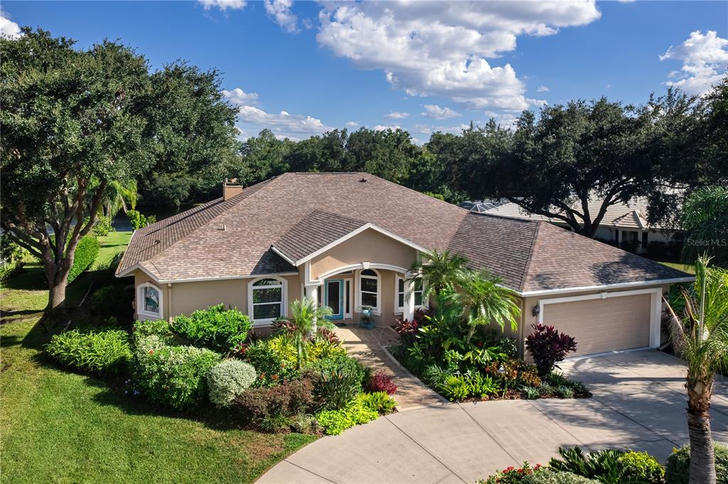 3302 Little Country Road Parrish, FL 34219 - Photo 1 of 1 a front view of a house with a yard