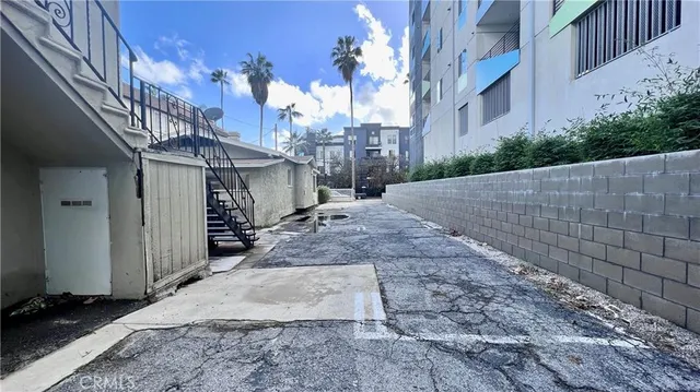 a view of a house with a street