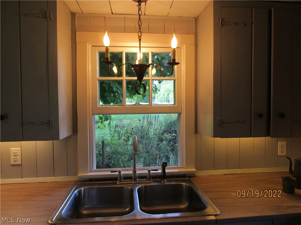 1454 Fixler Road Wadsworth, OH 44281 - Photo 12 of 28 Chandelier over kitchen sink.