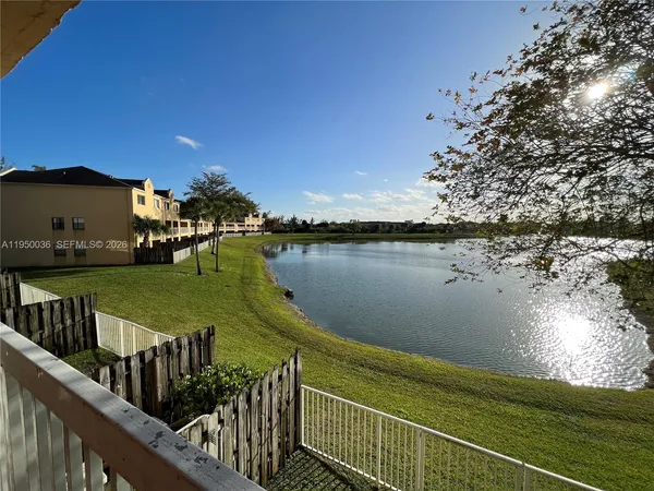 a view of a lake with a deck