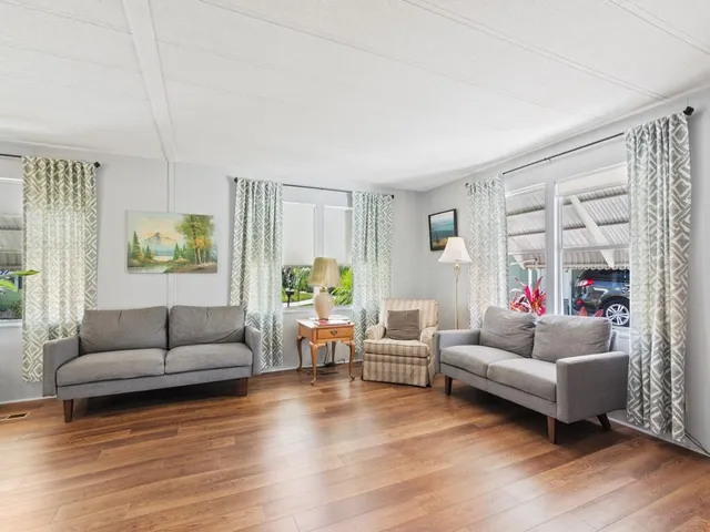 a living room with furniture and a couch