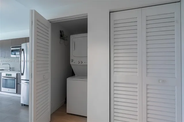 a view of hallway with washer and dryer