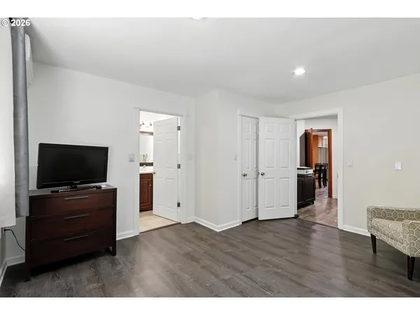 a view of a livingroom with wooden floor