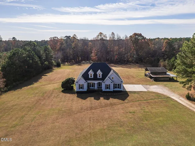 a bathroom with a sink and a lake view