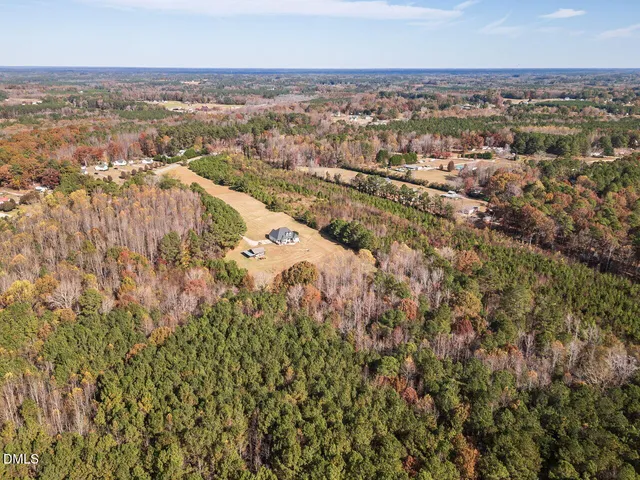 a view of a swimming pool and an outdoor seating
