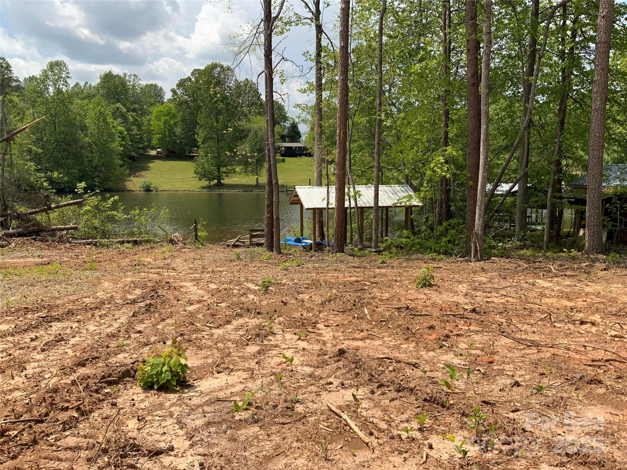 0 Navaho Trail, Unit 19 Rutherfordton, NC 28139 - Photo 8 of 11 a backyard of a house with lots of green space