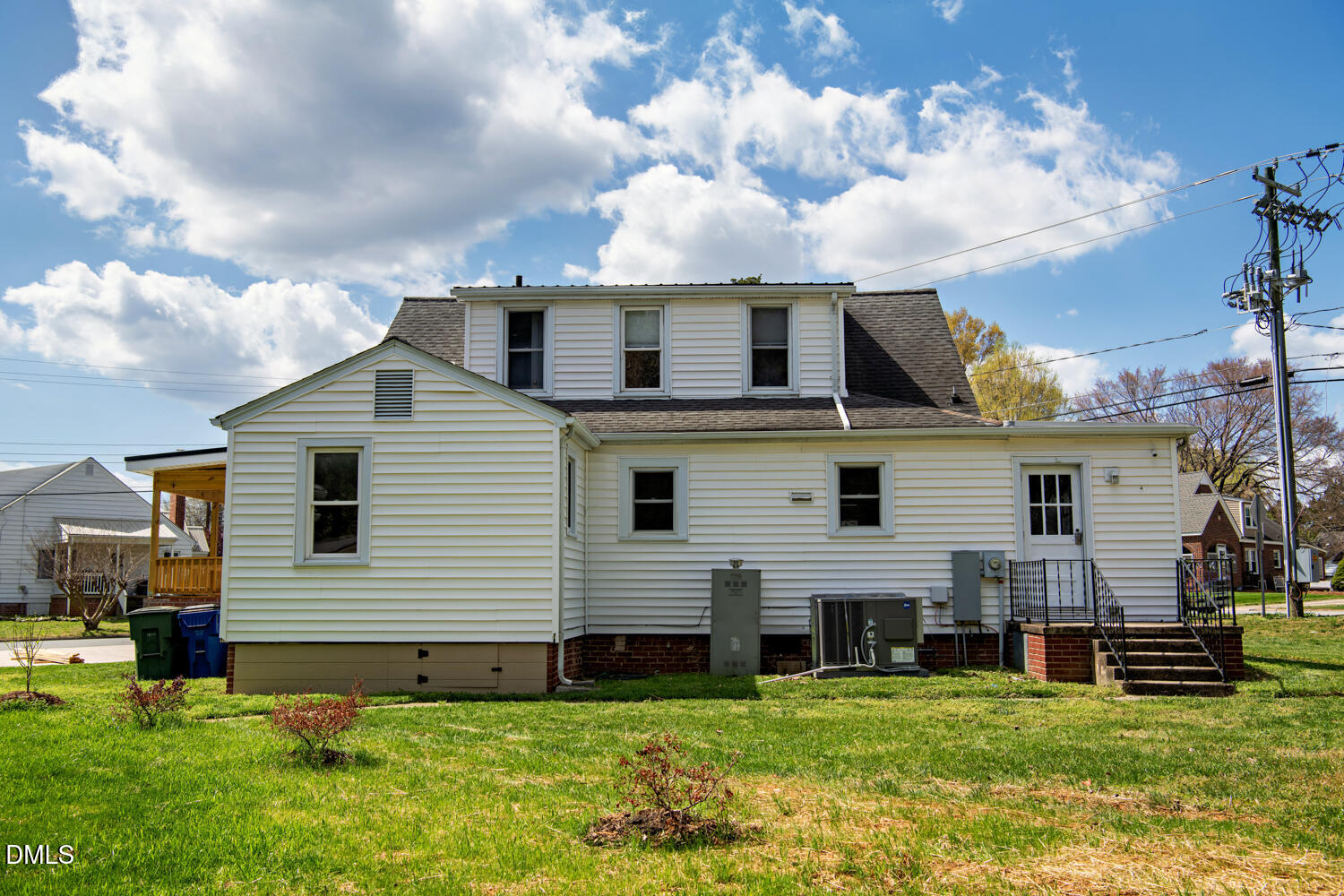 414 South Maple Street Graham, NC 27253 - Photo 26 of 42 a view of a house with a yard