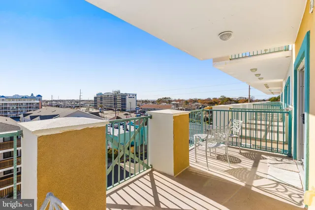 a view of a balcony with city view