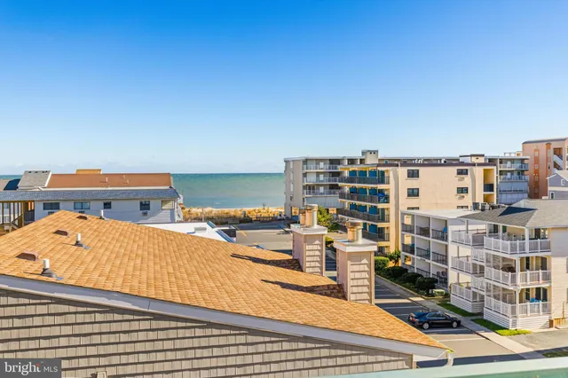 a view of a balcony with furniture