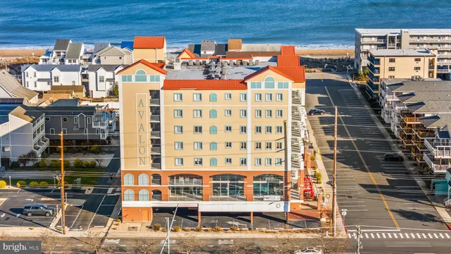 a view of a city with an ocean view