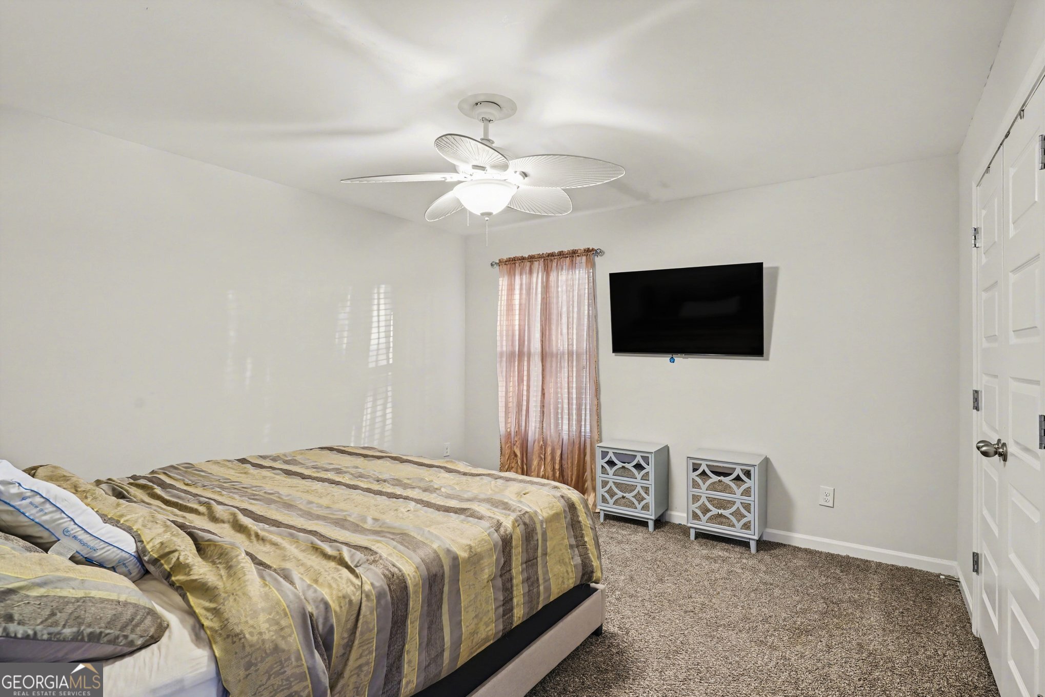 1241 England Terrace Hampton, GA 30228 - Photo 13 of 20 a bedroom with a bed and a flat screen tv