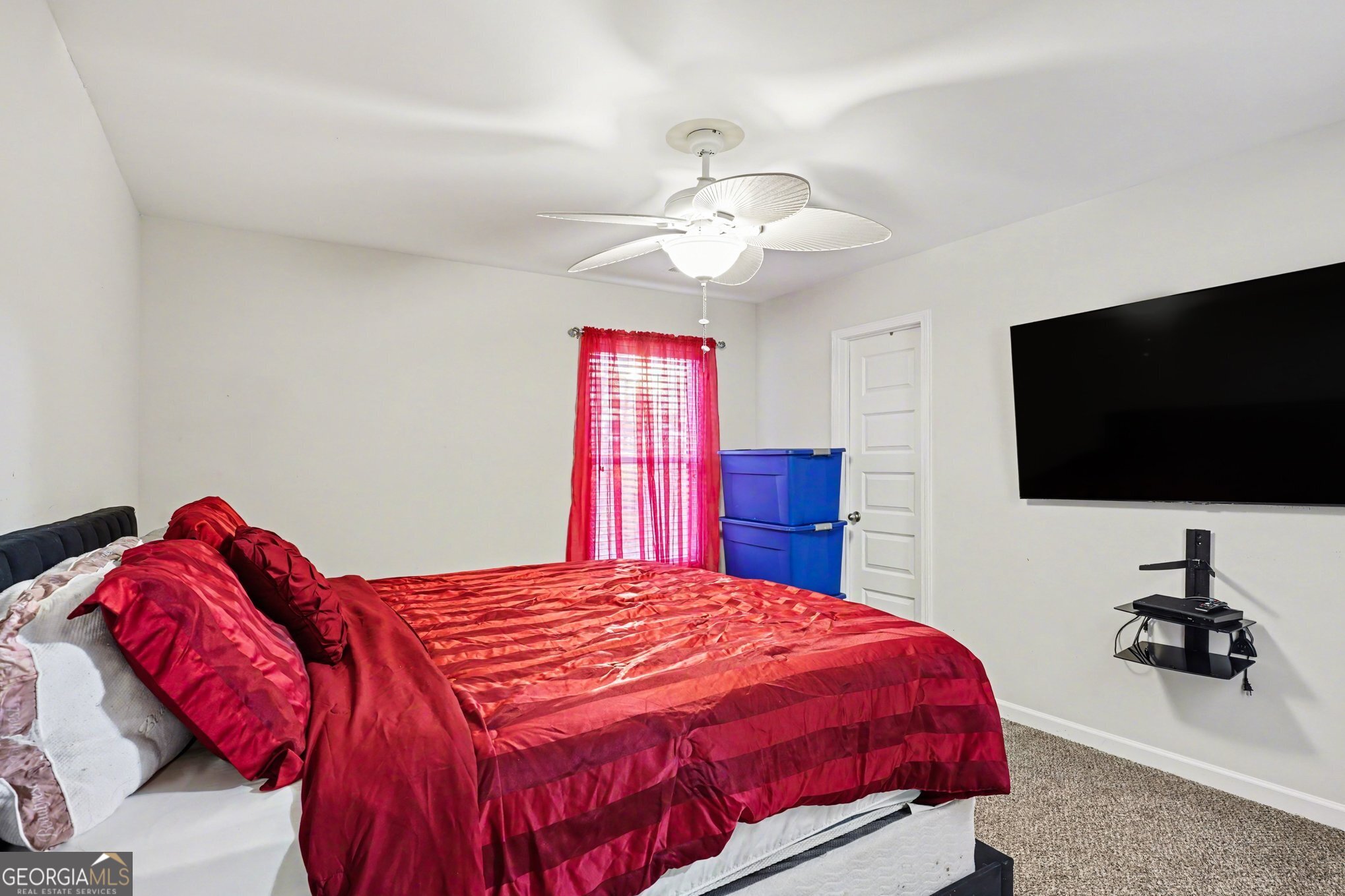 1241 England Terrace Hampton, GA 30228 - Photo 14 of 20 a bedroom with a bed and a flat screen tv