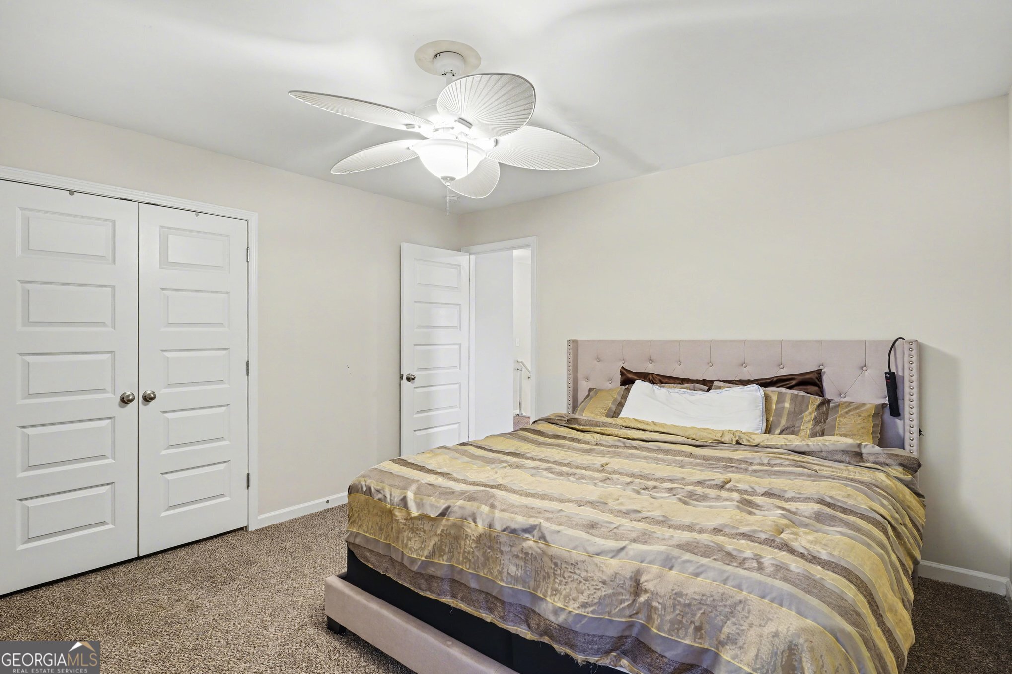 1241 England Terrace Hampton, GA 30228 - Photo 16 of 20 a bedroom with a bed and closet
