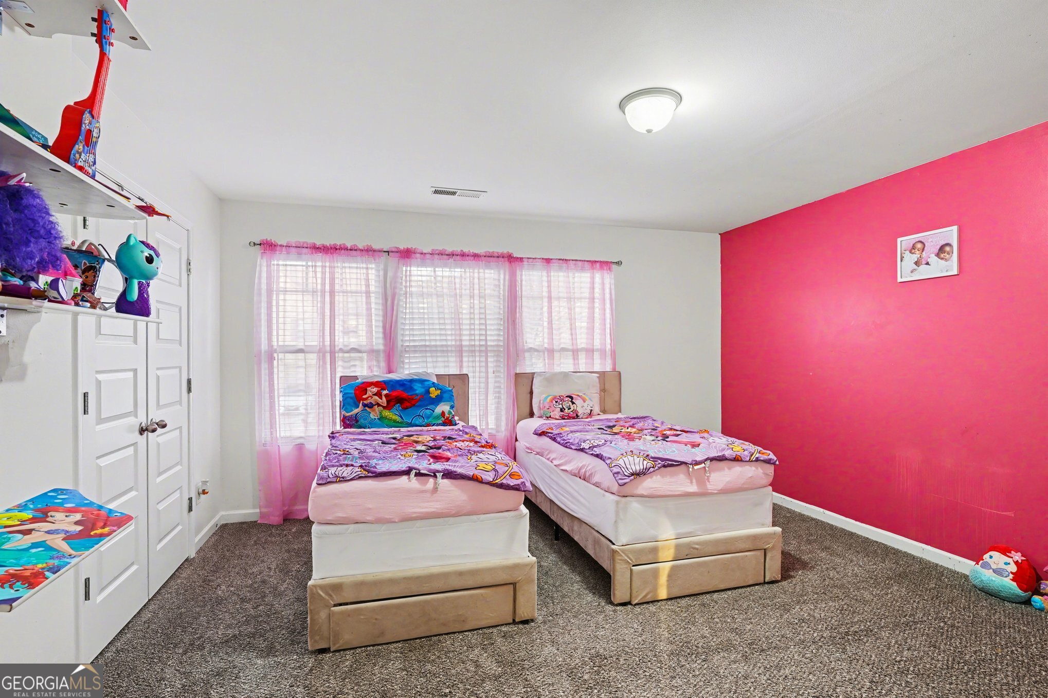 1241 England Terrace Hampton, GA 30228 - Photo 17 of 20 a bedroom with furniture and a baby crib