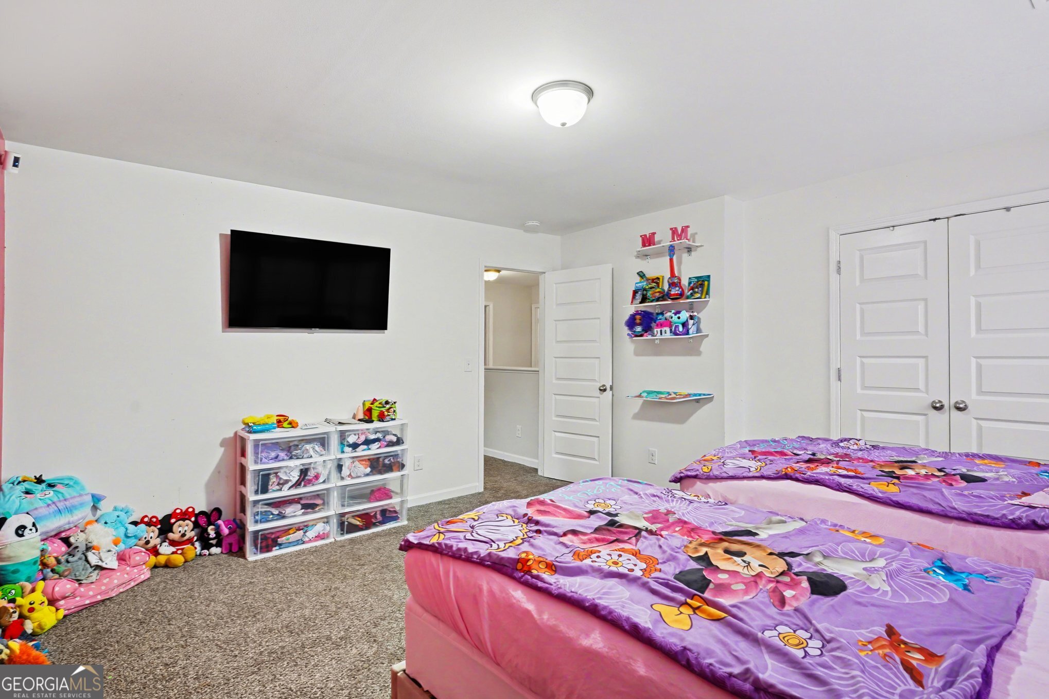 1241 England Terrace Hampton, GA 30228 - Photo 18 of 20 a bedroom with a bed and a flat screen tv