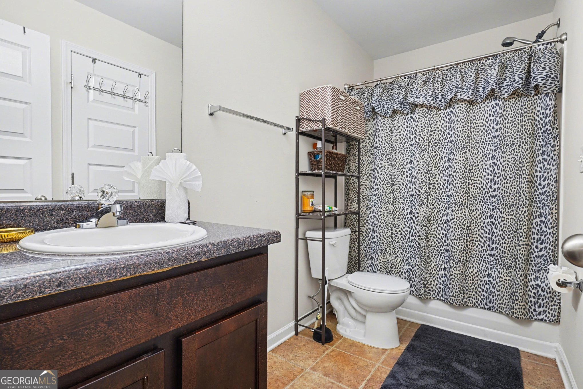 1241 England Terrace Hampton, GA 30228 - Photo 19 of 20 a bathroom with a sink toilet and shower