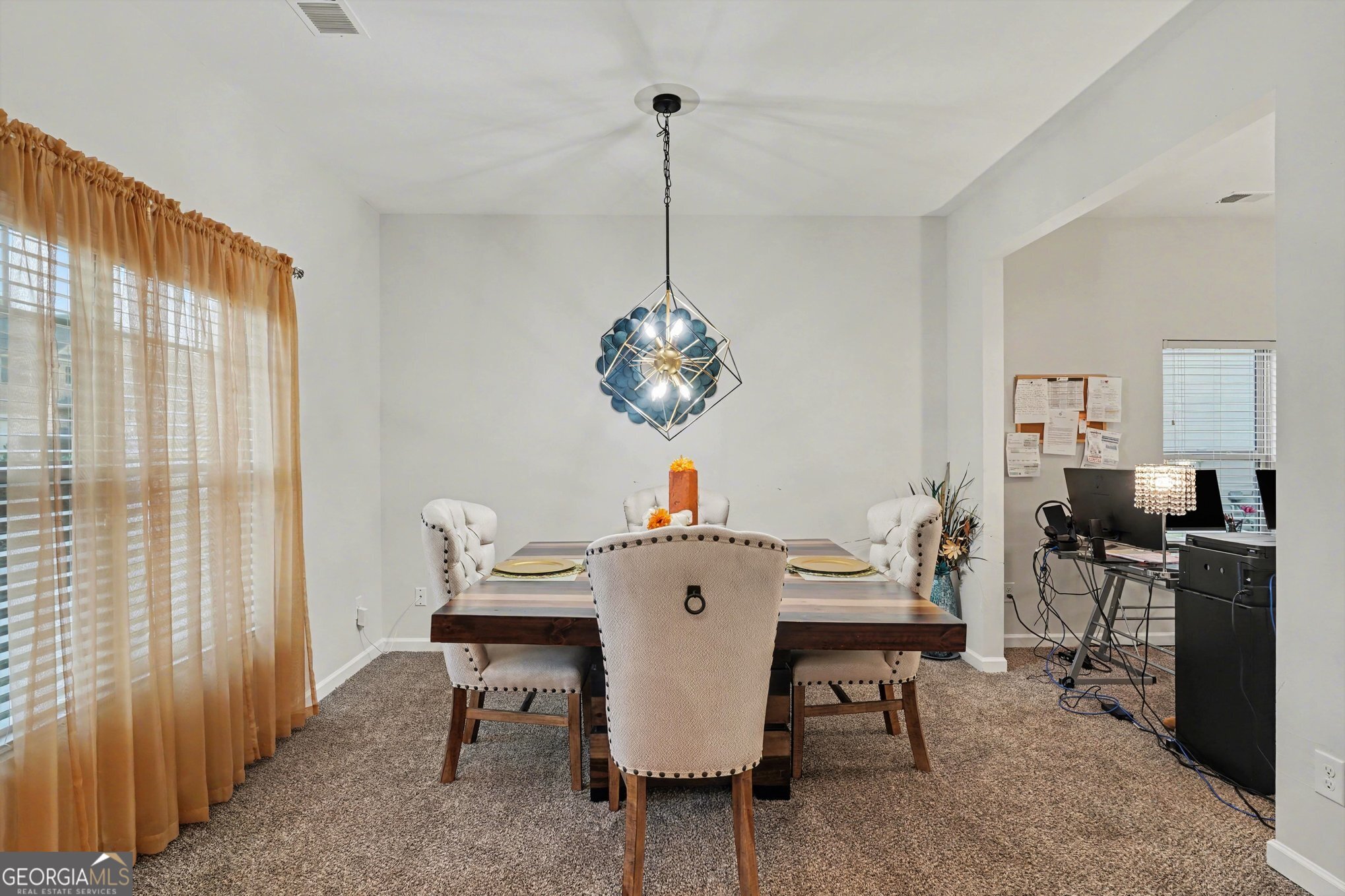 1241 England Terrace Hampton, GA 30228 - Photo 3 of 20 a view of a dining room with furniture window and outside view