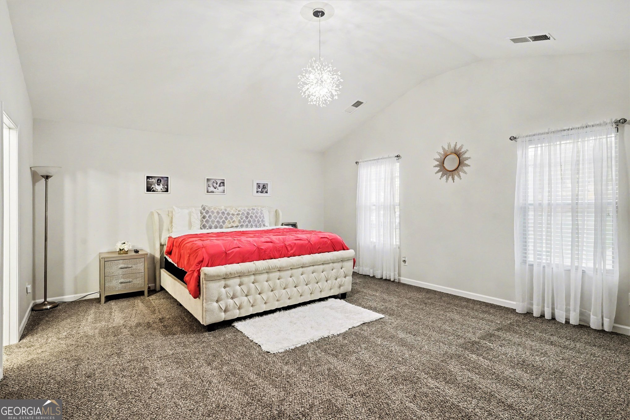 1241 England Terrace Hampton, GA 30228 - Photo 8 of 20 a bedroom with a bed and a window