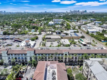 an aerial view of a house with a garden