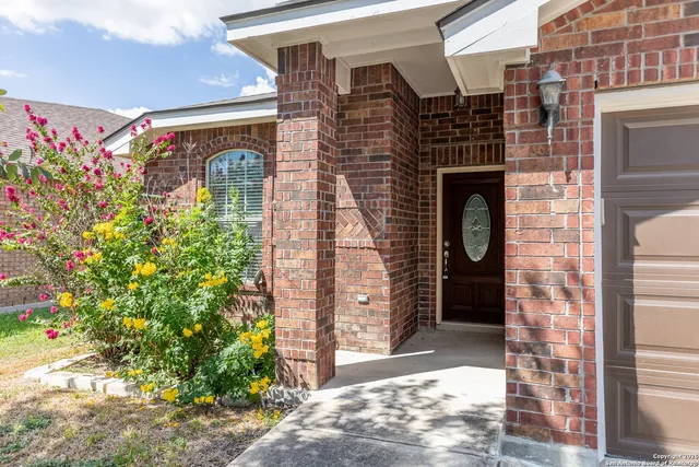 a front view of a house with a garage