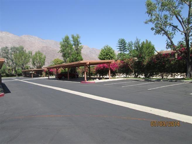 1050 Ramon Road, Unit 80 Palm Springs, CA 92264 - Photo 10 of 10 a view of street with houses