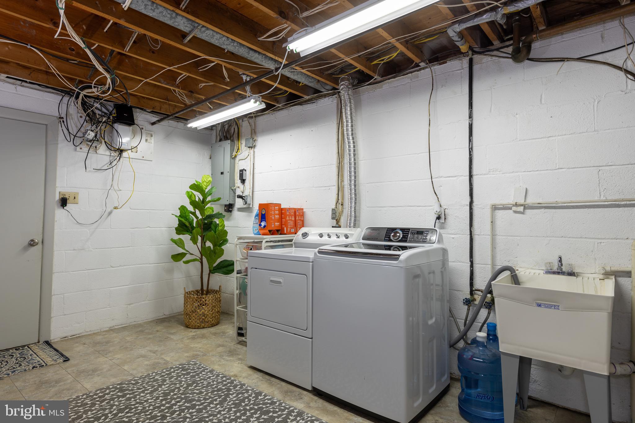 6224 Greeley Boulevard Springfield, VA 22152 - Photo 19 of 44 Large laundry room with loads of storage space!