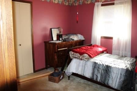 16544 Tionesta Road Pleasantville, PA 16341 - Photo 15 of 32 a bedroom with a bed and a table