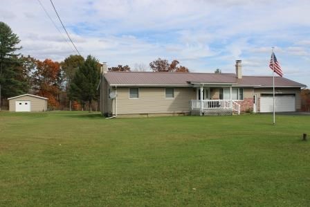 16544 Tionesta Road Pleasantville, PA 16341 - Photo 2 of 32 a front view of house with an outdoor space and seating