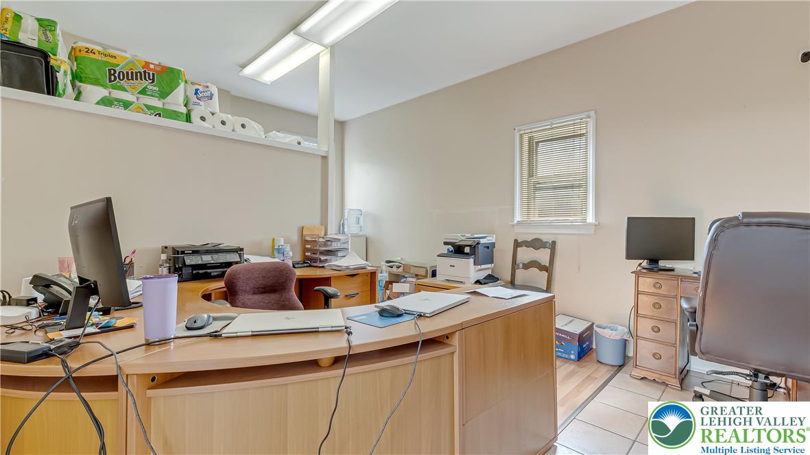 205 West Broad Street Bethlehem, PA 18018 - Photo 19 of 40 a work place with a desk and chair a barbeque with wooden floor