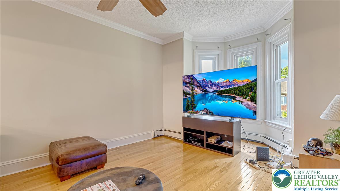 205 West Broad Street Bethlehem, PA 18018 - Photo 22 of 38 a room with furniture and a wooden floor