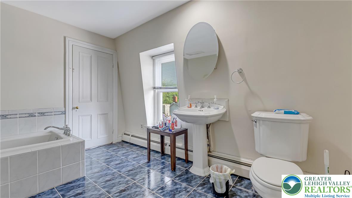 205 West Broad Street Bethlehem, PA 18018 - Photo 31 of 40 a bathroom with a sink toilet and shower