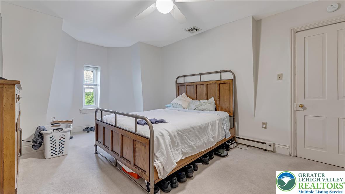 205 West Broad Street Bethlehem, PA 18018 - Photo 36 of 40 a bedroom with a bed and a window