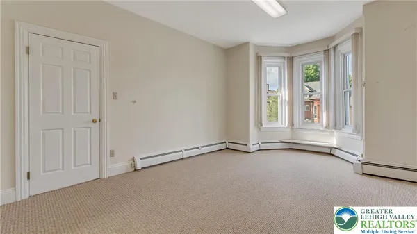an empty room with window