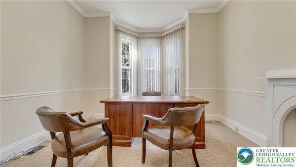 a view of a chair and table in a room