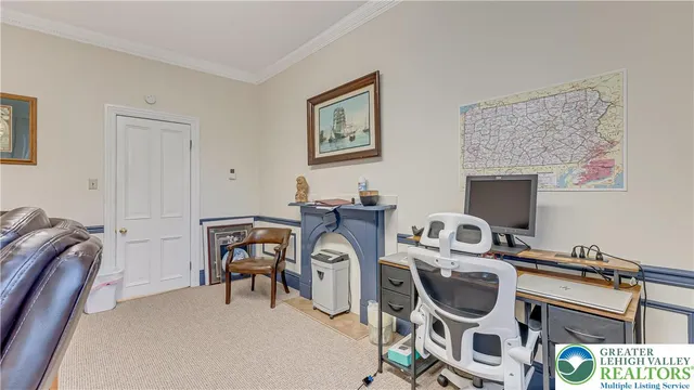 a view of a workspace with furniture