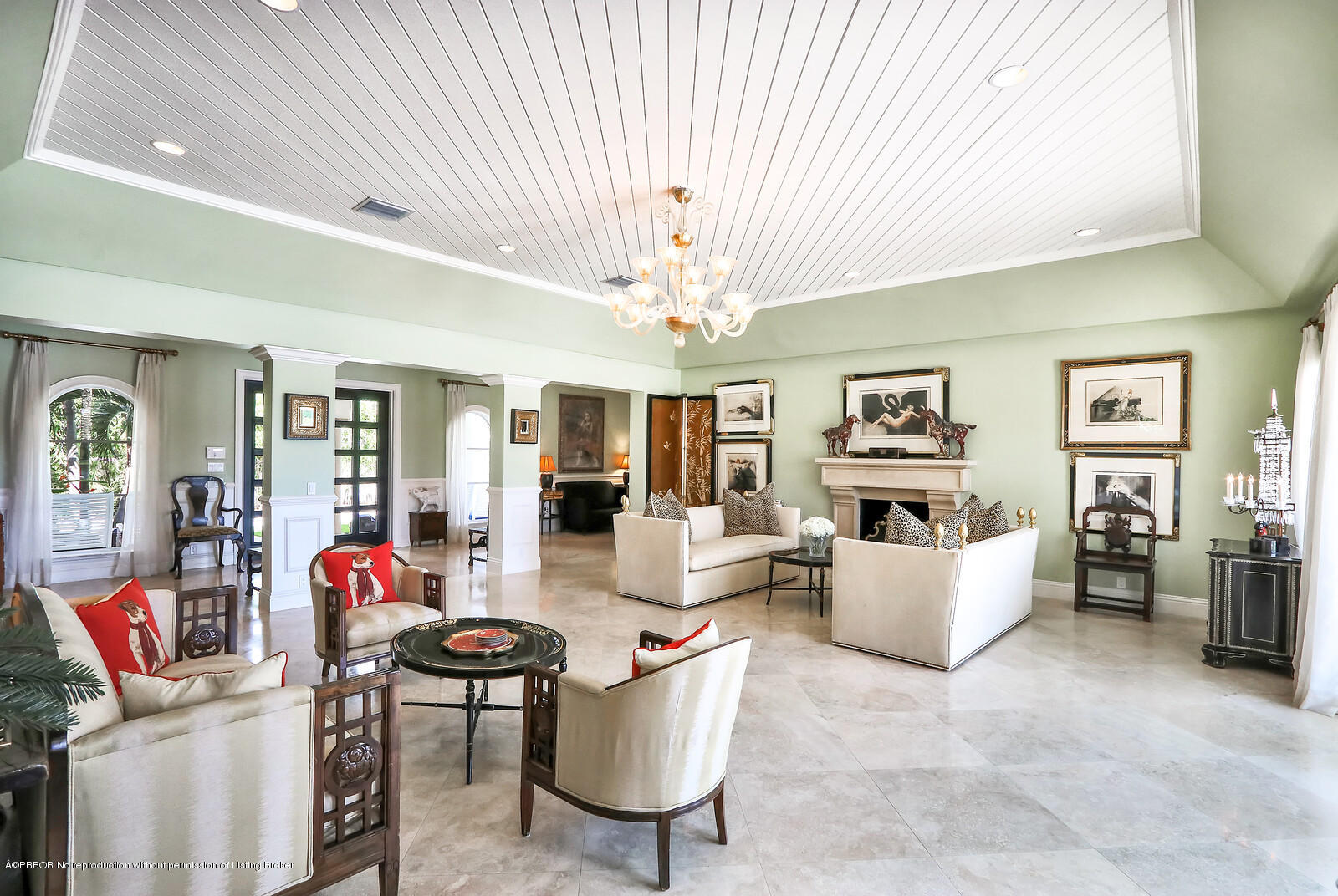 95 Spoonbill Road Manalapan, FL 33462 - Photo 11 of 32 a living room with furniture and a chandelier