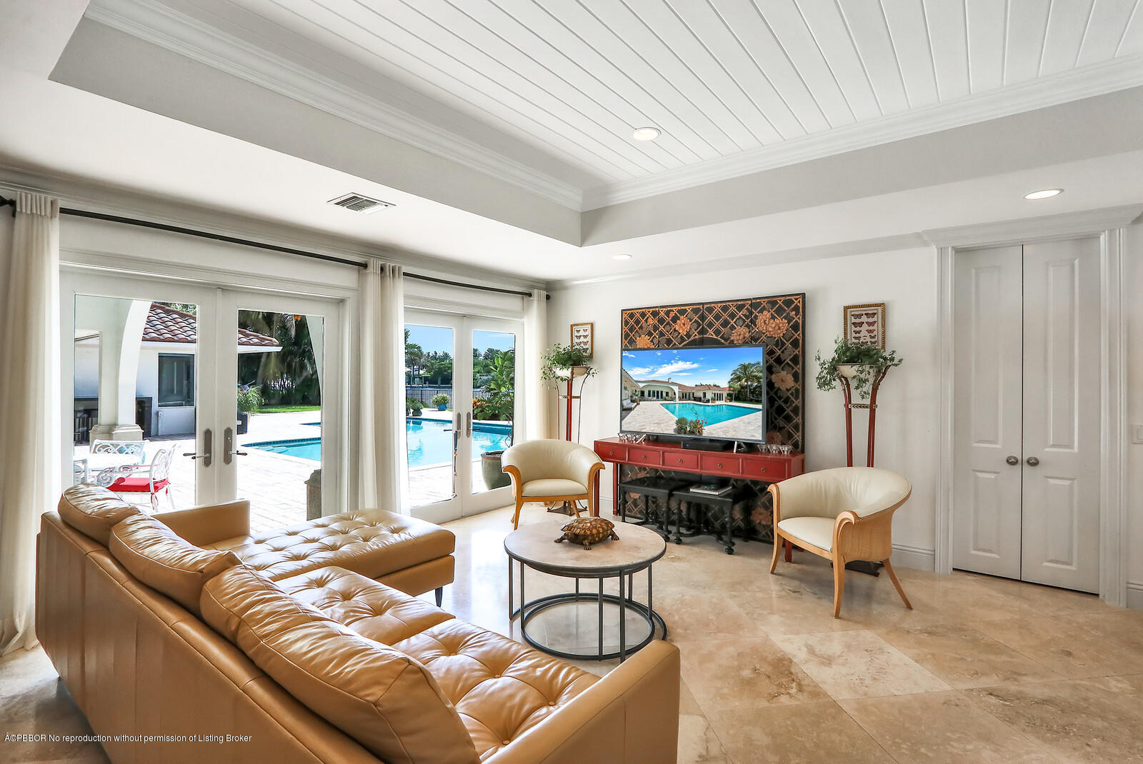 95 Spoonbill Road Manalapan, FL 33462 - Photo 15 of 32 a living room with furniture and a large window