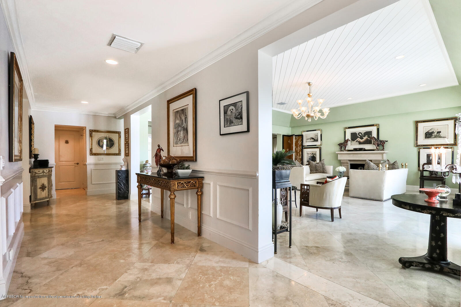 95 Spoonbill Road Manalapan, FL 33462 - Photo 18 of 32 a living room with furniture a dining table and chairs