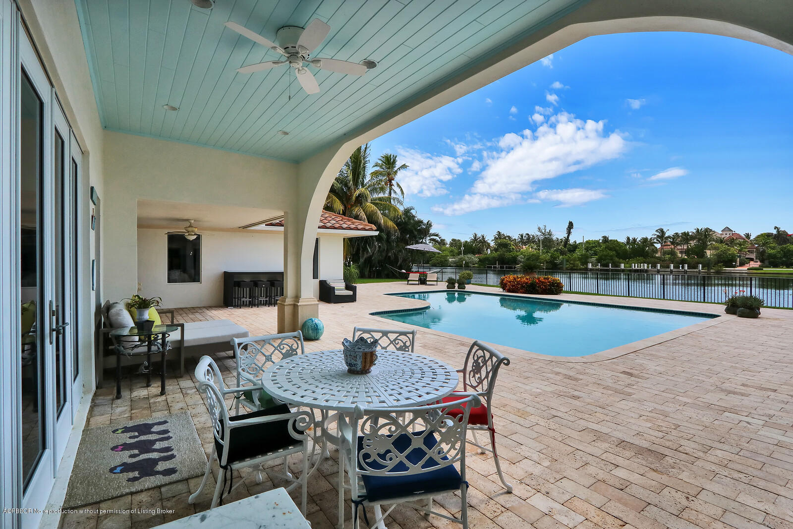 95 Spoonbill Road Manalapan, FL 33462 - Photo 26 of 32 a outdoor dining space with furniture