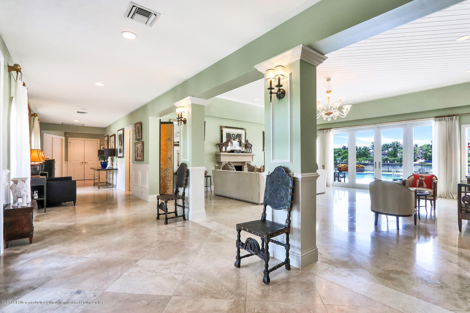 95 Spoonbill Road Manalapan, FL 33462 - Photo 6 of 32 a living room with fireplace furniture and a large window
