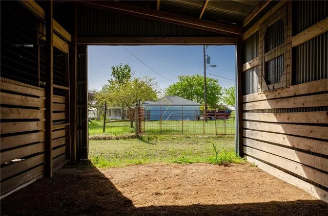 a view of a porch with a bench