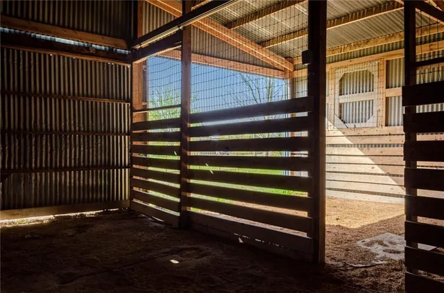a view of a house with a street